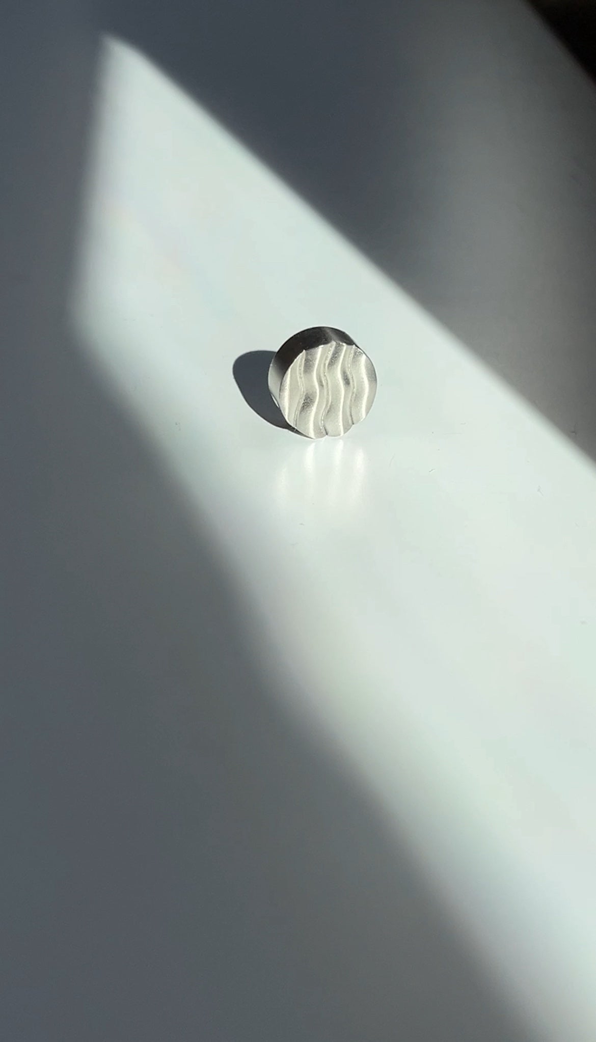 Wavy button