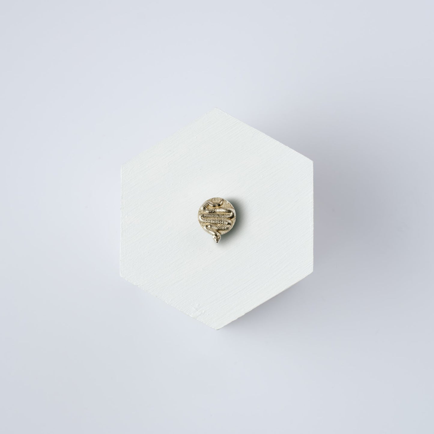 The Serpent button