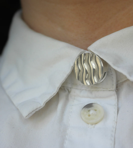 Wavy button
