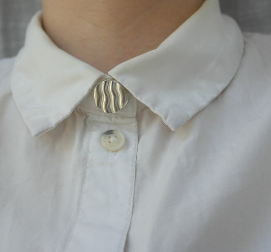Wavy button