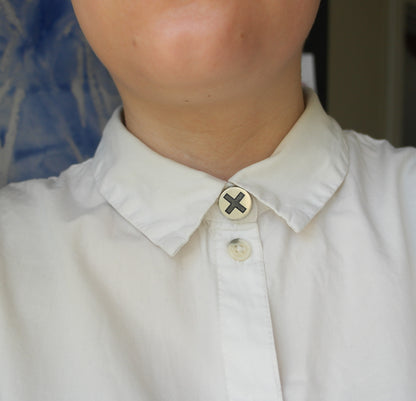 X button