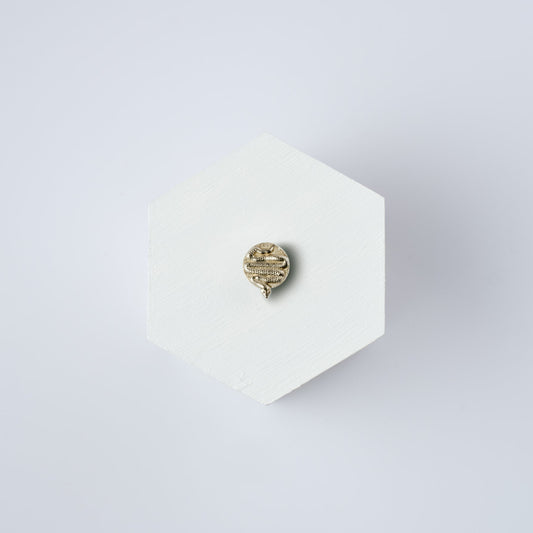 The Serpent button